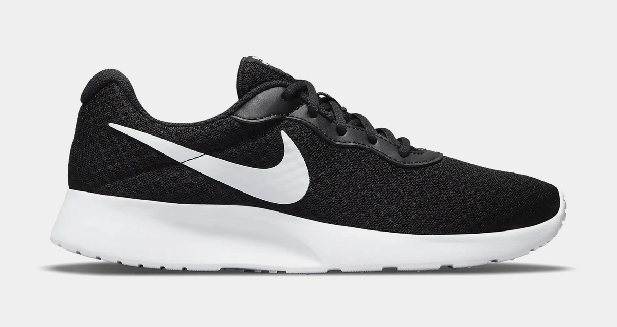 Black and clearance white nike tanjun